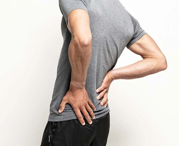 Person with lower back pain.