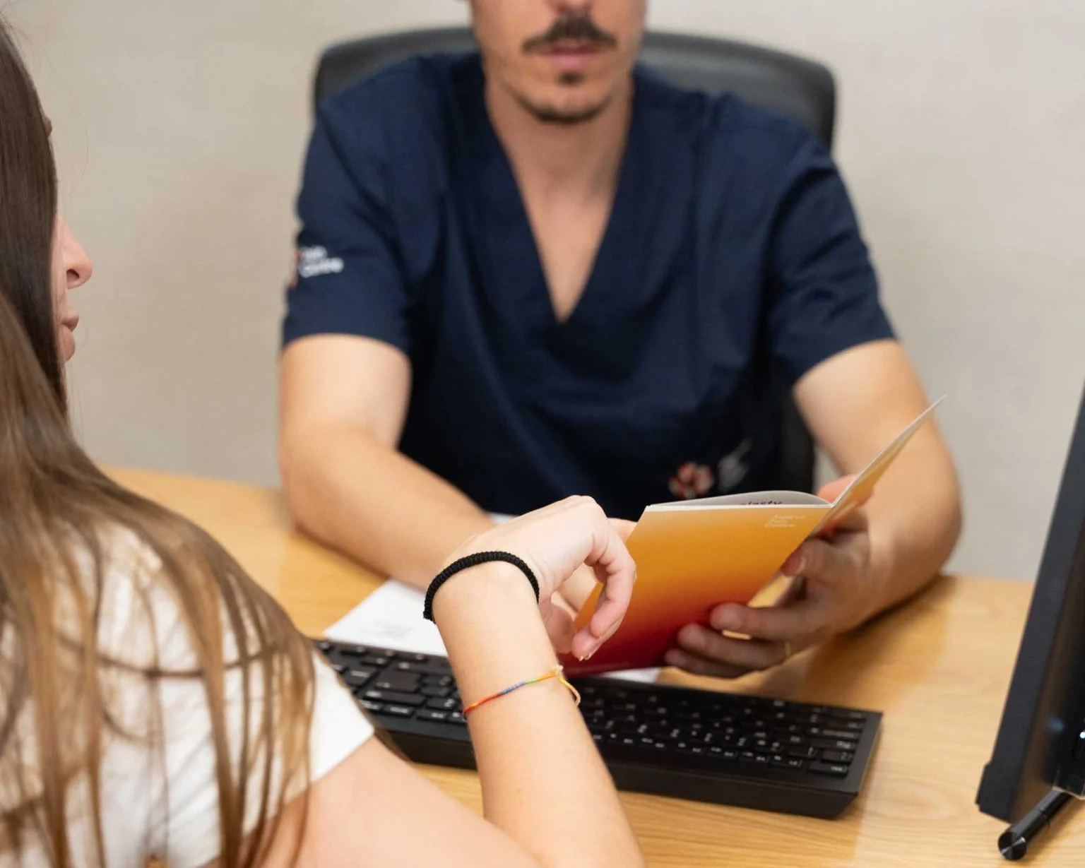 Speech and language therapy session supporting communication, voice, and swallowing care (illustrative).